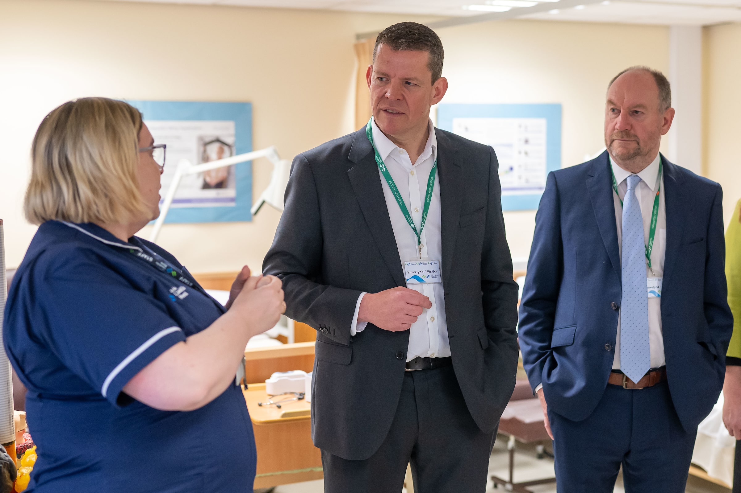 Cefin Campbell MS with a nurse and Rhun ap Iorwerth AS